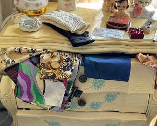 vintage rotary dial phone, head vases, and scarves 