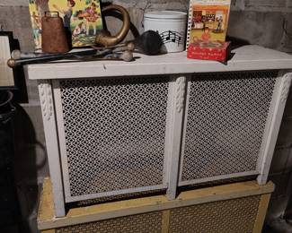 antique horn, cow bell, and coloring books 