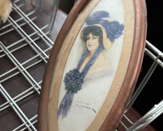 cute little oval framed lithograph 