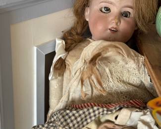 antique Jumeau ? porcelain doll large with a few pieces of clothing (she may also be a Armand Marseille