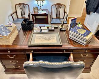 leather embossed top on the high end executive desk by Sligh