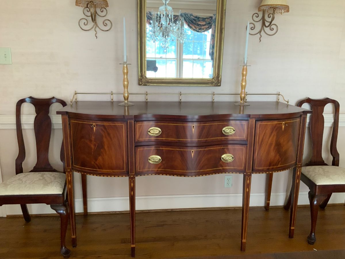 Henkel Harris Sideboard. Federal style with inlaid mahogany. Measures approximately 66” wide, 25” deep and 38” high.