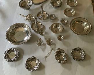 Beautiful collection of Sterling Silver. Tiffany & Co. sterling silver candlesticks in center.