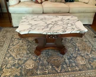 Antique Rosewood coffee table with beveled edge marble top.