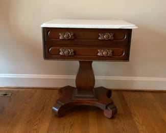 Antique Rosewood and marble top side table. Located in the piano room.