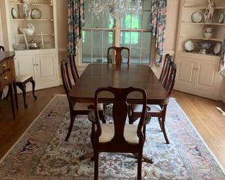 8 Henkel Harris dining room chairs. 2 captain’s and 6 regular. Solid mahogany with neutral fabric seats.