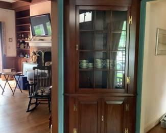 The other Henkel Harris Fairfax 12 Pane lighted corner cabinet. I took all the merchandise out of both cabinets. Now located on display tables.