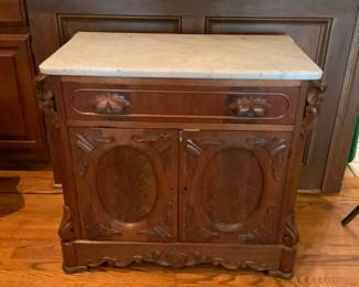 Antique marble top cabinet.