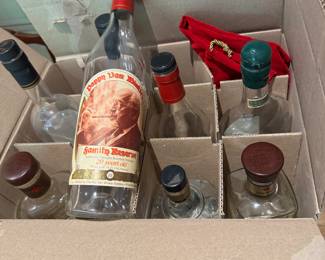 Pappy Van Winkle bottle and other collectible bottles