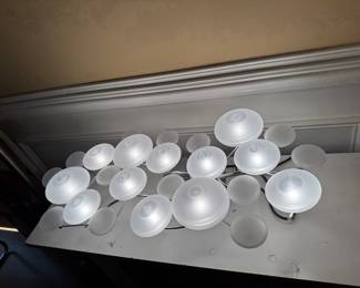 This is actually a light fixture can be hung or plugged in and awesome lighted sculpture