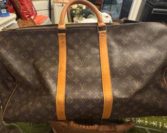 Two LV Carryall bags