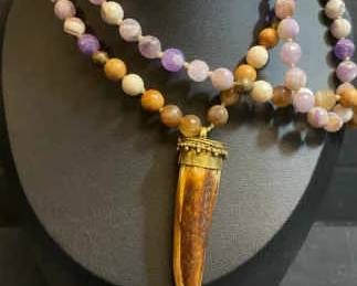 Buffalo Bone Horn Pendant On A Multi Beaded Strand
