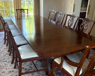 Henkel-Harris Mahogany Dining Table (2001) with Maitland-Smith Chairs
Exceptional formal dining set featuring a Henkel-Harris solid mahogany double pedestal dining table with decorative banded inlay and brass-accented feet. Table includes matching leaves for extended seating capacity. The craftsmanship and rich wood grain reflect the renowned Henkel-Harris tradition, dated 2001.