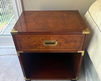 One of 2
Hekman Campaign-Style Nightstand
Classic Hekman nightstand with a single drawer, recessed brass campaign pull, and open lower shelf. Finished in burled veneer with brass corner accents.
• Condition: Very good, some light wear consistent with use