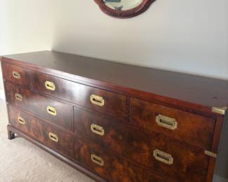 Hekman Campaign-Style Dresser
Beautiful long dresser by Hekman Grand Rapids, featuring nine drawers, recessed brass campaign-style pulls, and burled veneer fronts. Exceptional craftsmanship and ample storage make this a standout piece for any bedroom or living space.
• Condition: Very good, light wear consistent with age