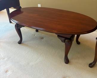 Mahogany Oval Queen Anne Coffee Table
Classic oval coffee table crafted in mahogany, featuring a beveled edge top and elegant Queen Anne cabriole legs. A timeless piece that pairs well with traditional living room décor, especially when matched with similar end tables.