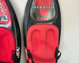 O’Brien Freestyle kneeboard with red/black styling. Features easy-start hull shape and padded knee wells for comfort. Adjustable strap for secure rides. Perfect for lake adventures.