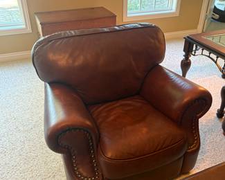Coordinating brown leather loveseat with rolled arms and nailhead trim. Great for smaller spaces or paired with the sofa. Gently used, comfortable, and well-built.