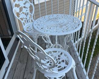 White Cast Aluminum Bistro Set (Table + 2 Chairs)
Lovely outdoor bistro set including one round table and two matching chairs. Features ornate rose floral patterns throughout and a crisp white painted finish. Made of durable cast aluminum — sturdy, weather-resistant, and easy to maintain.