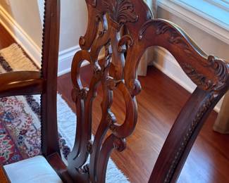 Paired with a set of Maitland-Smith carved mahogany dining chairs, upholstered in cream fabric. The chairs feature an elegant pierced back design with stretcher support, offering both stability and refined styling.
• Condition: Fantastic, minimal wear for the age they always kept pads on!
Dining table and Maitland-Smith chairs are sold separately