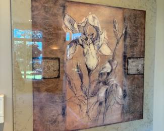 Unique floral wall art with a sketch-style flower in tones of cream, brown, and black. Features a textured background with abstract details and a glossy frame with marbled accents. Adds sophistication and artistic flair to any living space.