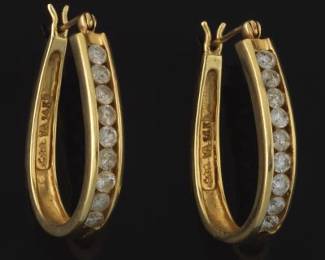A Pair of Diamond Hoop Earrings
