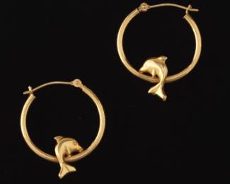 A Pair of Gold Hoop and Dolphin Earrings