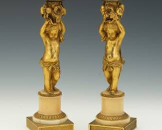 Pair of Gilt Metal and Composition Figural Candlesticks