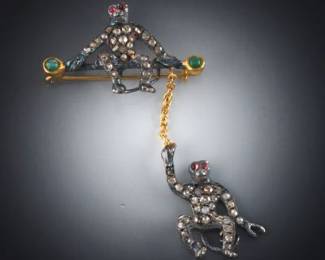 Charming Sterling Silver, Diamond, Gold, and Emerald Monkeys Brooch