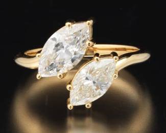 Pair of Marquise Solitaire Diamonds in 18K Bypass Mount