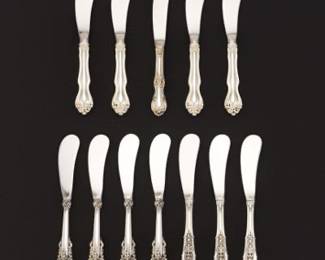 Twelve Hollow Handle Butter Spreaders