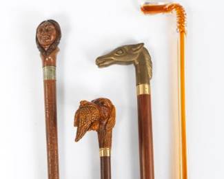 A Group of Four Walking Sticks