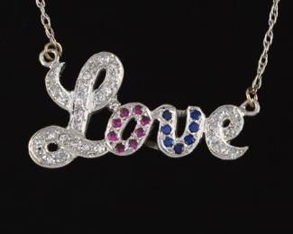 Ladies Art Deco Gold, Diamond, Ruby and Blue Sapphire Love Necklace