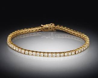 Ladies Gold and Diamond Line Tennis Bracelet