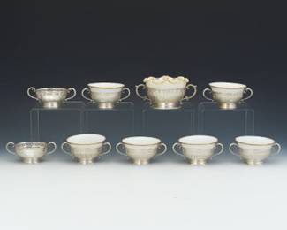 Collection of Eight Sterling Bouillon Holders with Six Porcelain Cups, and One Sterling Holder with Porcelain Croutons Bowl