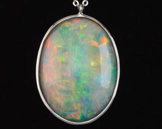 Ladies Gold and 7.50 Ct Opal Pendant on Chain