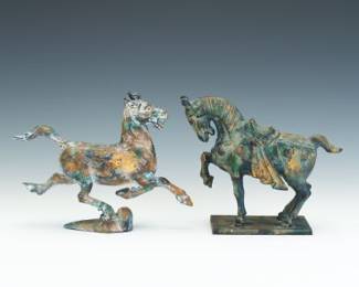 Two Chinese Tang Dynasty Style Patented Iron Horses