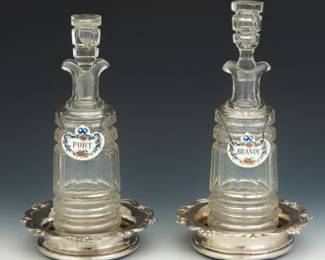 Two Liquor Bottles With Two Wine Coasters