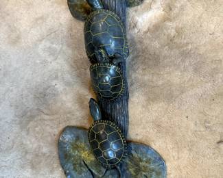 A Sunny Day bronze sculpture by Montana artist Eric Thorsen. 3 Turtles on a log surrounded by lily pads. 