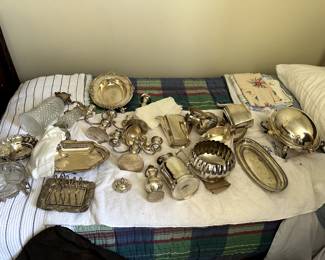 A small sample of sterling and fine silver-plate for sale.