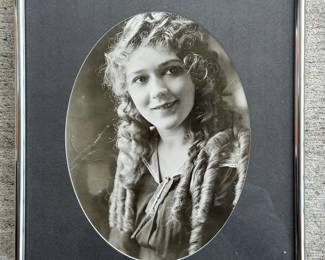 One of 16 original silver gelatin photos from Hollywood's silent era. Handsomely framed and matted.