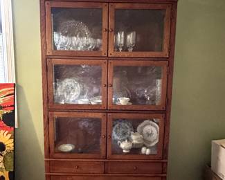 Bob Timberlake Arts & Crafts display cabinet with rain glass panes.