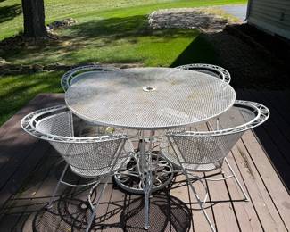 Vintage wrought iron patio table and chairs