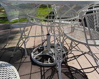 Vintage wrought iron patio table and chairs