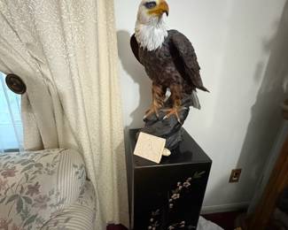 . . . lovely eagle atop an Asian-themed pedestal