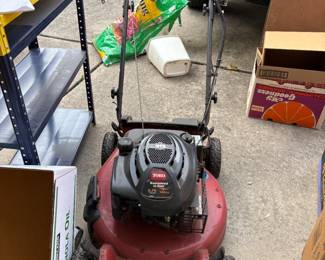 . . . Toro self-pace lawn mower