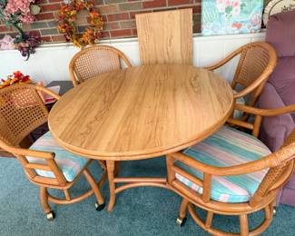 RATTAN DINING SET - ROUND TABLE W/LEAF AND 4 CHAIRS W/CUSHIONS