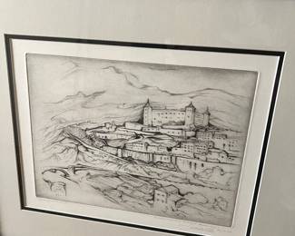 This image shows a framed ink drawing by Karl Baumann, depicting a cityscape