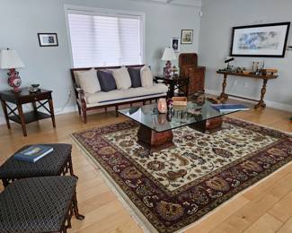 Low glass top, two plinth legs Coffee Table