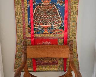 Tibetan Thanga behind an Oak Chair
